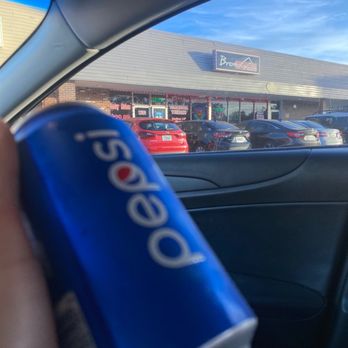 Bronx Pizza - a can of pepsi in a car - Pizza Near Me - Orlando, Florida