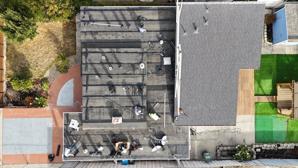 Slide of ELM Roofing Contractors