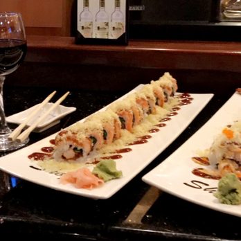 Edojin Sushi - two plates of sushi and a glass of wine - Japanese Near Me - Cypress, Texas