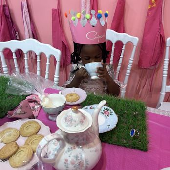Cupcakin Bakery - a little girl sitting at a table - Bakeries Near Me - Kansas City, Missouri Cupcakin Bakery - a little girl sitting at a table - Bakeries Near Me - Kansas City, Missouri