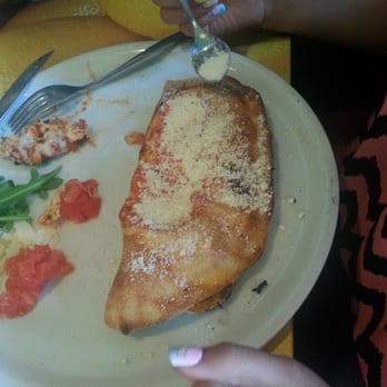 Piola - Weston - Sorry my family was so hungry they couldn't wait for the picture lol but this is a calzone - Pizza Near Me - Weston, Florida Piola - Weston - Sorry my family was so hungry they couldn't wait for the picture lol but this is a calzone - Pizza Near Me - Weston, Florida