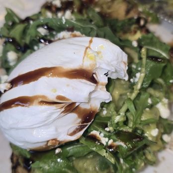 Broken Yolk Cafe - Avocado poached egg over toast - Breakfast & Brunch Near Me - La Quinta, California Broken Yolk Cafe - Avocado poached egg over toast - Breakfast & Brunch Near Me - La Quinta, California