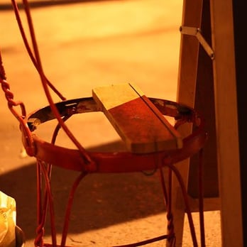 Lucali - chair outside that piqued my interest as I fumed - Pizza Near Me - Brooklyn, New York