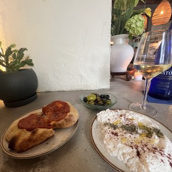 Othello - Harissa bread, whipped feta, and olives - Seafood Near Me - Jacksonville, Florida