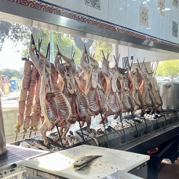 El Rey del Cabrito - Cabrito roasting over open coals - Steakhouses Near Me - Monterrey, NLE