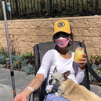 Mobile IV Medics - Chilling on the patio with an IV and pup. - IV Hydration Near Me Mobile IV Medics - Chilling on the patio with an IV and pup. - IV Hydration Near Me