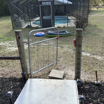 Outlaw Junk Removal - A gate and post before replacement - Fences & Gates Near Me - Lake city , Florida Outlaw Junk Removal - A gate and post before replacement - Fences & Gates Near Me - Lake city , Florida