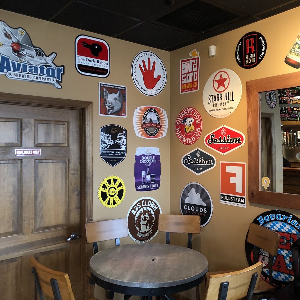 Growler Grlz - Corner of seating area. - Beer, Wine & Spirits Near Me - Durham, North Carolina Growler Grlz - Corner of seating area. - Beer, Wine & Spirits Near Me - Durham, North Carolina