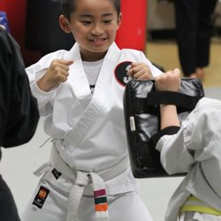 Level 3 Martial Arts Performance - Our Children's program improves focus and concentration - two things essential for good grades, staying safe, and performing at your best!