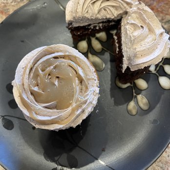 Whisks and Roses - a chocolate cupcake with frosting - Cupcakes Near Me Whisks and Roses - a chocolate cupcake with frosting - Cupcakes Near Me