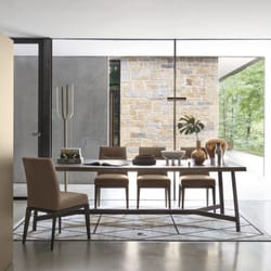 Calligaris - The Division bookcase makes a perfect room divider! Shown: Division bookcase, Tosca dining chairs, and Status dining table.