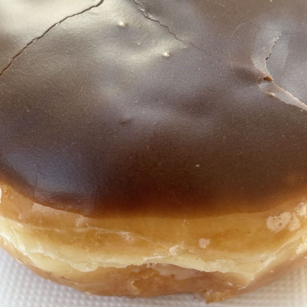 Star Donuts - chocolate glazed with cream filling - Donuts Near Me - Newbury Park, California Star Donuts - chocolate glazed with cream filling - Donuts Near Me - Newbury Park, California