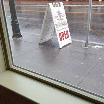 Theo's Downtown Diner - Our view from the table. Sandwich board showing where Theo's was located. - Diners Near Me - New Milford, Connecticut Theo's Downtown Diner - Our view from the table. Sandwich board showing where Theo's was located. - Diners Near Me - New Milford, Connecticut