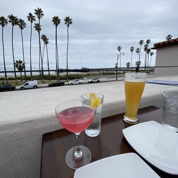 Oku - Rooftop view with drinks - Sushi Bars Near Me - Santa Barbara, California Oku - Rooftop view with drinks - Sushi Bars Near Me - Santa Barbara, California