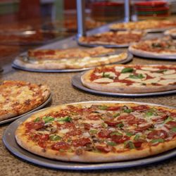 Piazza Italia - Variety of pizza available by the slice