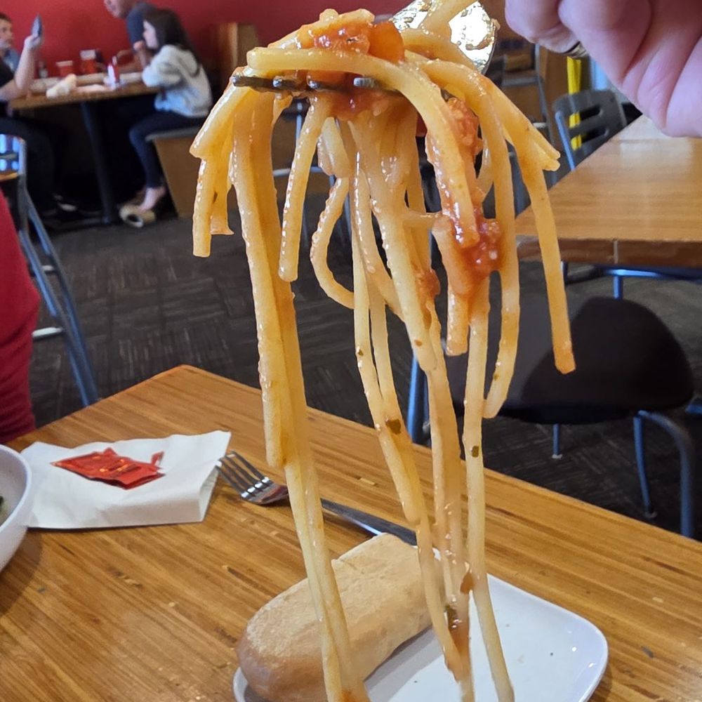 Noodles and Company - Fork of broken pasta - Salad Near Me - Lincoln, Nebraska