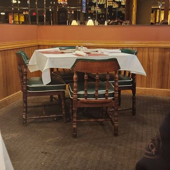 Pitch's - a table and chairs in a restaurant - American Near Me - Milwaukee, Wisconsin Pitch's - a table and chairs in a restaurant - American Near Me - Milwaukee, Wisconsin
