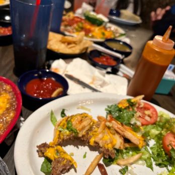 Green Onion - a plate of food on a table - Desserts Near Me - Moreno Valley, California Green Onion - a plate of food on a table - Desserts Near Me - Moreno Valley, California