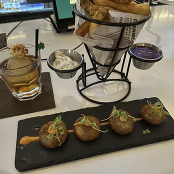 John Martin's - Pub Fry Trio, truffle pastrami croquette, and John Martins old fashioned - Irish Near Me - Miami, Florida John Martin's - Pub Fry Trio, truffle pastrami croquette, and John Martins old fashioned - Irish Near Me - Miami, Florida