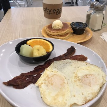 City Egg - Eggs, bacon, fruit cup and two mini pancakes. And with coffee, all less than $10. - Breakfast & Brunch Near Me - Toledo, Ohio