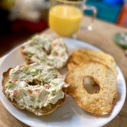 Taste Of New York Bagels & Deli - Everything bagel with veggie cream cheese and buttered bialy