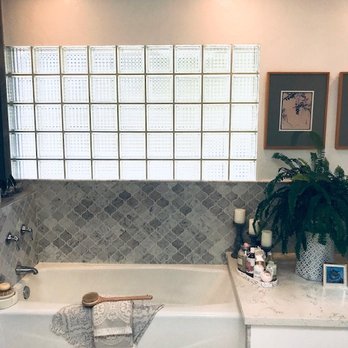 Lindgren Construction - New tub with marble lantern tile and quartz shelf - General Contractors Near Me