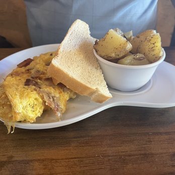 Two Chicks Cafe - Build your Chicks Omelet with bacon and smoked gouda - Breakfast & Brunch Near Me - New Orleans, Louisiana Two Chicks Cafe - Build your Chicks Omelet with bacon and smoked gouda - Breakfast & Brunch Near Me - New Orleans, Louisiana