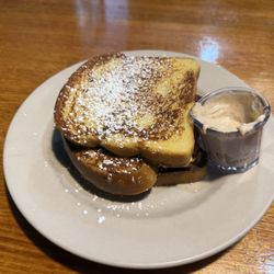 Crooked Tree Cafe - Horchata French toast with honey cinnamon cream cheese topping. I ate one piece of it already