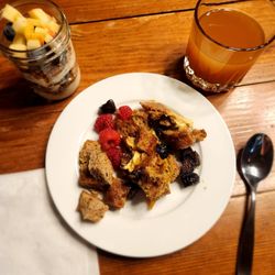 White Rabbit Inn - Homemade breakfast of baked French toast, yogurt parfait, and cider.