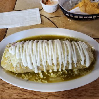 Gonzalez's Restaurant - Two meat wet burrito in green salsa - Mexican Near Me - Orange, California Gonzalez's Restaurant - Two meat wet burrito in green salsa - Mexican Near Me - Orange, California