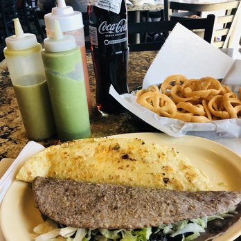 Tortas Insurgentes - a plate of food on a table - Mexican Near Me - Dallas, Texas