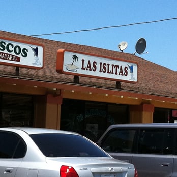 Las Islitas Mariscos - cars parked in front of a restaurant - Mexican Near Me - Watsonville, California
