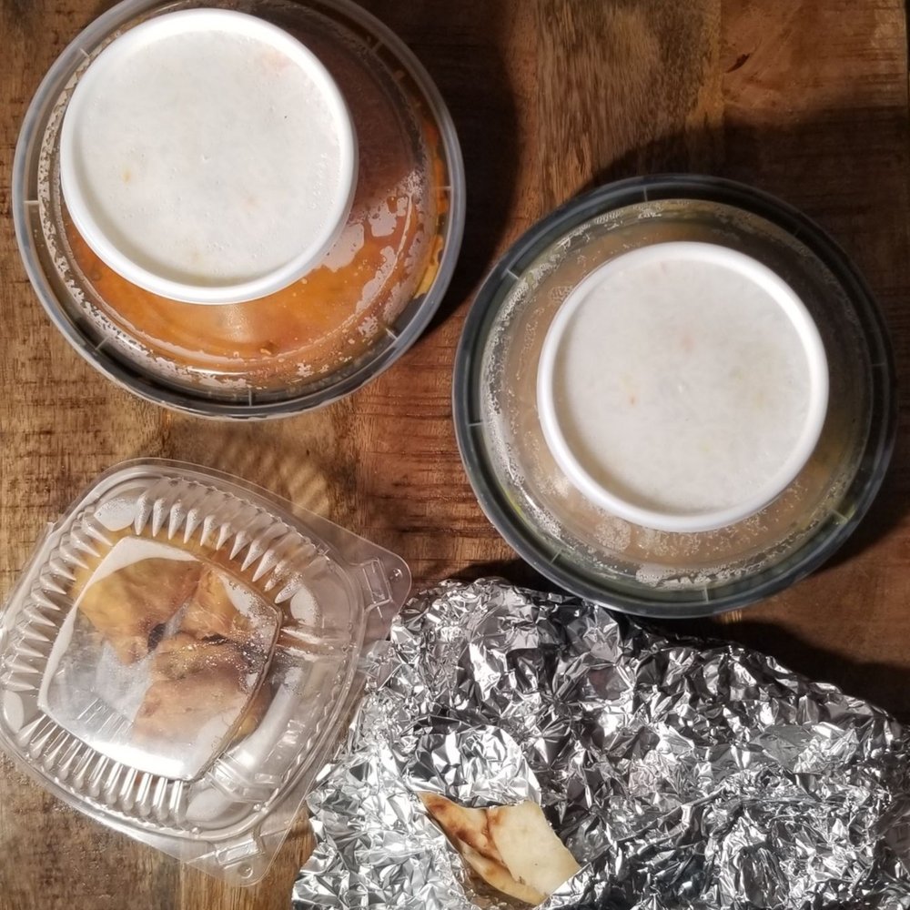 One container of samosa (each order has three, so this container with 3 is one order) and one order of naan. One container of samosa (each order has three, so this container with 3 is one order) and one order of naan.