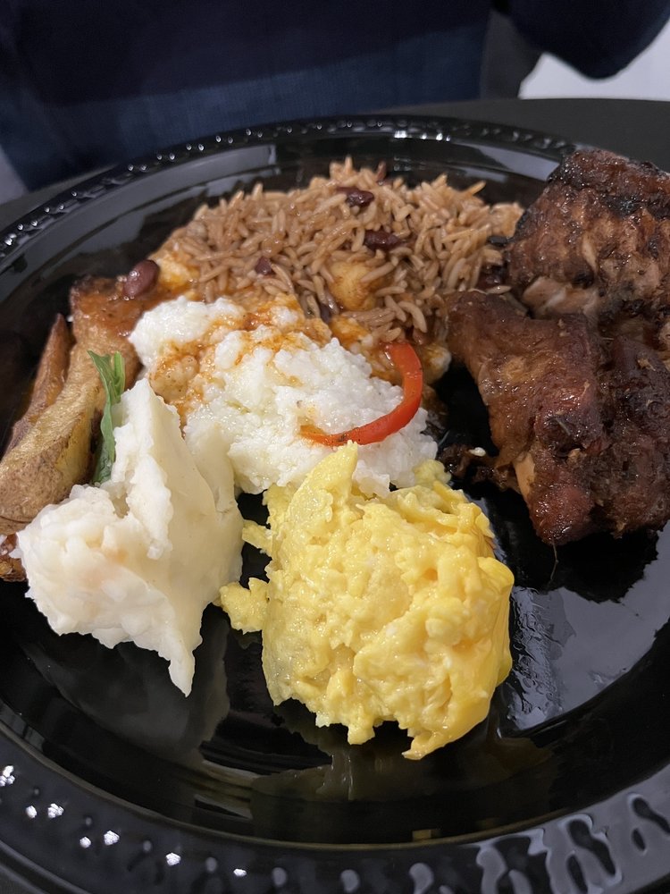 Cheesy scrambled eggs, mashed potato, home fries, Haitian rice, sweet