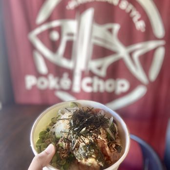 Poke Chop - a person holding a bowl of food - Poke Near Me - Encinitas, California Poke Chop - a person holding a bowl of food - Poke Near Me - Encinitas, California