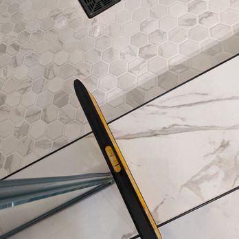 Century City Baths & Remodels - Shower ledge pitched outwards instead of towards the drain - General Contractors Near Me - Bensenville, Illinois Century City Baths & Remodels - Shower ledge pitched outwards instead of towards the drain - General Contractors Near Me - Bensenville, Illinois