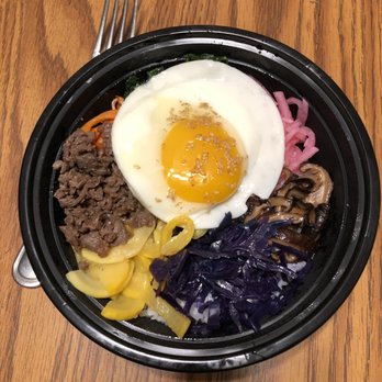 Gumii - This is the bibimbap with egg and beef. I had to get it to go so this photo is taken at home. - Korean Near Me - Naperville, Illinois Gumii - This is the bibimbap with egg and beef. I had to get it to go so this photo is taken at home. - Korean Near Me - Naperville, Illinois