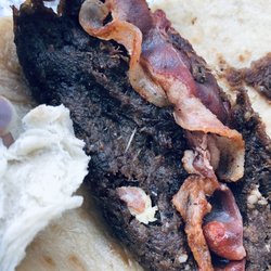 Stripes - Raw tortilla. Why is there bacon on this barbacoa? Didn't ask for it.