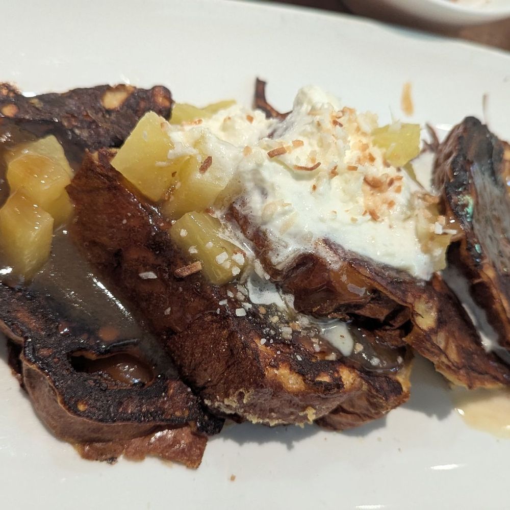 Another Broken Egg Cafe - Seasonal Pina Colada French Toast - American Near Me - Baton Rouge, Louisiana Another Broken Egg Cafe - Seasonal Pina Colada French Toast - American Near Me - Baton Rouge, Louisiana