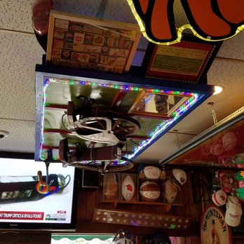 Village Bar - Interesting art fills every inch - Pubs Near Me - Madison, Wisconsin