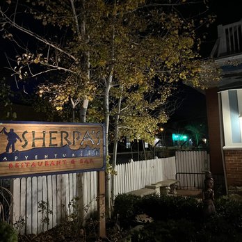Sherpa's Adventures Restaurant & Bar - the entrance at night - Himalayan/Nepalese Near Me - Boulder, Colorado