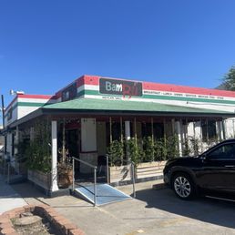 Front of the building with their outdoor seating Front of the building with their outdoor seating