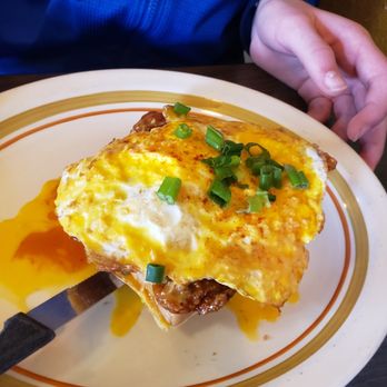 Hash - Orange Chicken and Waffles with egg on top - Breakfast & Brunch Near Me - Olympia, Washington Hash - Orange Chicken and Waffles with egg on top - Breakfast & Brunch Near Me - Olympia, Washington