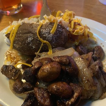 Texas Roadhouse - Petite steak with mushrooms and onions with a loaded baked potato - Barbeque Near Me - Anchorage, Alaska