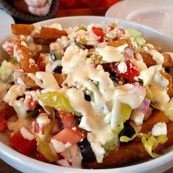 Rasselbock Kitchen & Beer Garden - Dudes salad, fries with toppings, no salad. - German Near Me - Long Beach, California Rasselbock Kitchen & Beer Garden - Dudes salad, fries with toppings, no salad. - German Near Me - Long Beach, California