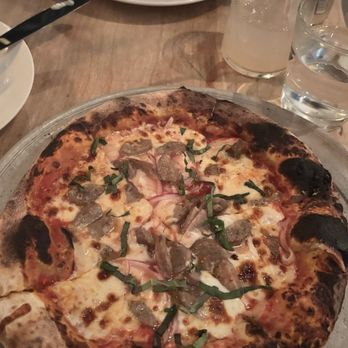 Source Restaurant - neopolitan pizza with garlic, red onion & sausage + bolognese - Pizza Near Me - Cambridge, Massachusetts