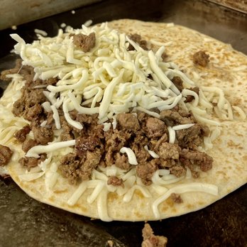 Chayos Tacos - Prepping our delicious quesadilla - Tacos Near Me - Roswell, New Mexico Chayos Tacos - Prepping our delicious quesadilla - Tacos Near Me - Roswell, New Mexico