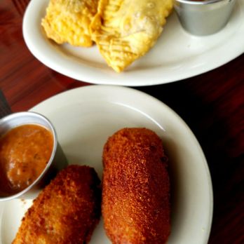 Cuba 512 - Appetizers: eggplant and beef empanadas with ham and pork croquettes. - Caribbean Near Me - Austin, Texas Cuba 512 - Appetizers: eggplant and beef empanadas with ham and pork croquettes. - Caribbean Near Me - Austin, Texas