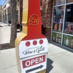 Lowcountry Wine & Spirits - I love the new giant bottle "open" sign here.