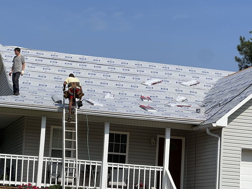 Slide of Clark Roofing